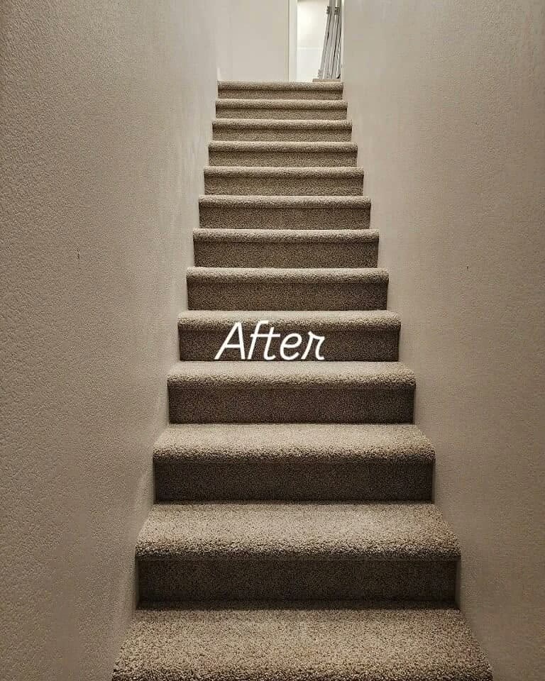 The same stairway after the work, with carpet laid over every tread.